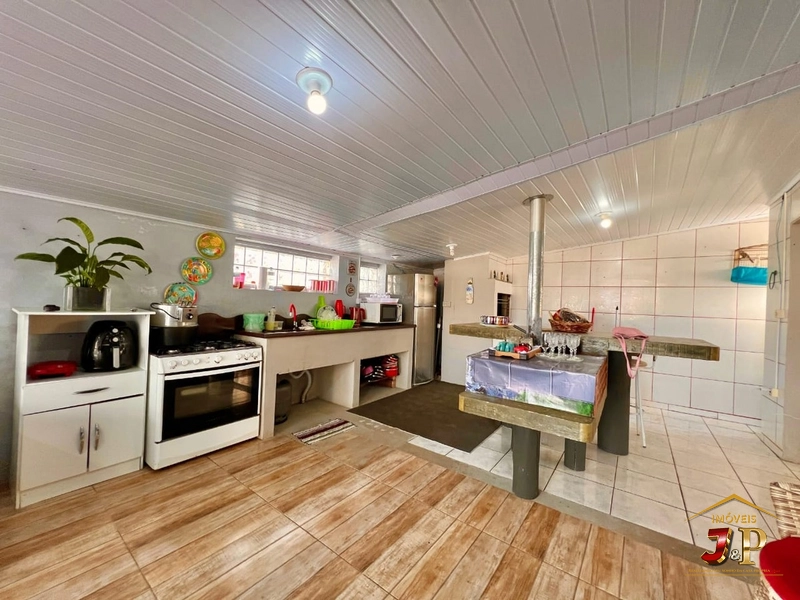 Linda casa bem localizada com 2 dormitórios e piscina: 11ª foto da galeria de imagens do imóvel