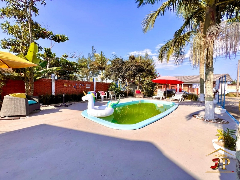 Linda casa bem localizada com 2 dormitórios e piscina: 5ª foto da galeria de imagens do imóvel