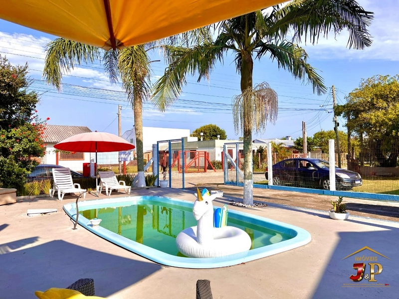 Linda casa bem localizada com 2 dormitórios e piscina: 7ª foto da galeria de imagens do imóvel