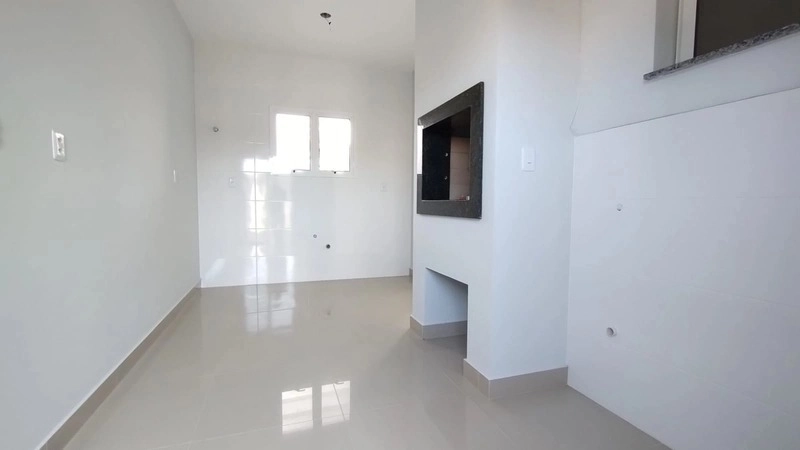 Casa com dois dormitórios próxima a praia: 3ª foto da galeria de imagens do imóvel