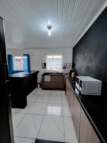 Casa com anexo nos fundos em Capão da Canoa: 12ª foto da galeria de imagens do imóvel