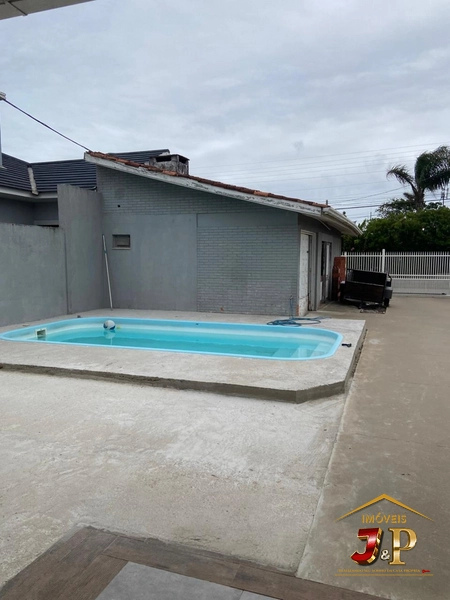 Casa com 2 dormitórios, quiosque e piscina: 18ª foto da galeria de imagens do imóvel