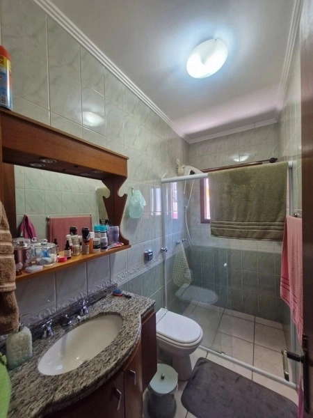 Casa a uma quadra do mar com 4 dormitórios: 13ª foto da galeria de imagens do imóvel