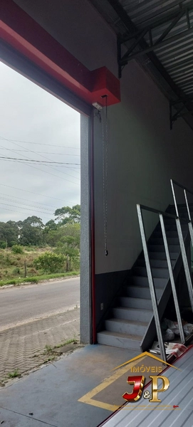 Pavilhão industrial de frente para a avenida: 3ª foto da galeria de imagens do imóvel