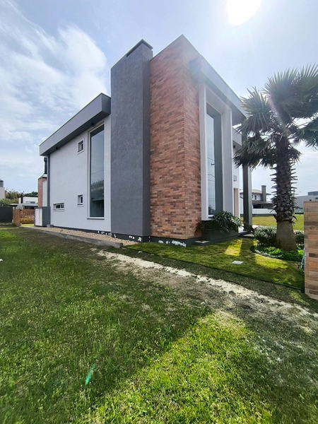 Casa em Condomínio Fechado em Tramandaí: 2ª foto da galeria de imagens do imóvel