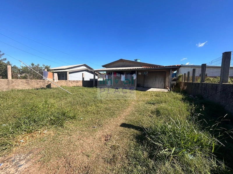 CASA EM TERRENO AMPLO COM CONSTRUÇÃO | ZONA NOVA SUL: 3ª foto da galeria de imagens do imóvel