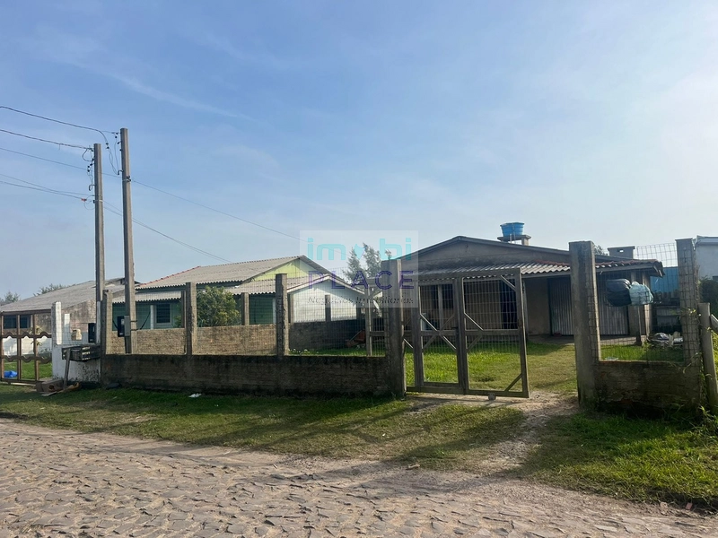 CASA EM TERRENO AMPLO COM CONSTRUÇÃO | ZONA NOVA SUL: 2ª foto da galeria de imagens do imóvel