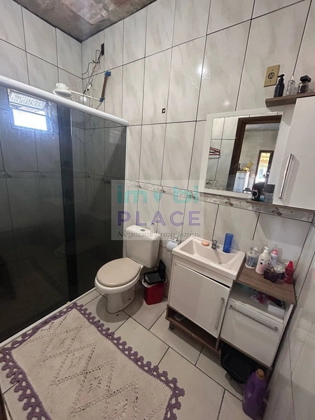 CASA EM TERRENO AMPLO COM CONSTRUÇÃO | ZONA NOVA SUL: 10ª foto da galeria de imagens do imóvel