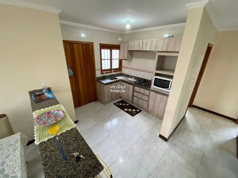 Linda residência a poucos metros do centrinho de Nova Tramandaí: 4ª foto da galeria de imagens do imóvel