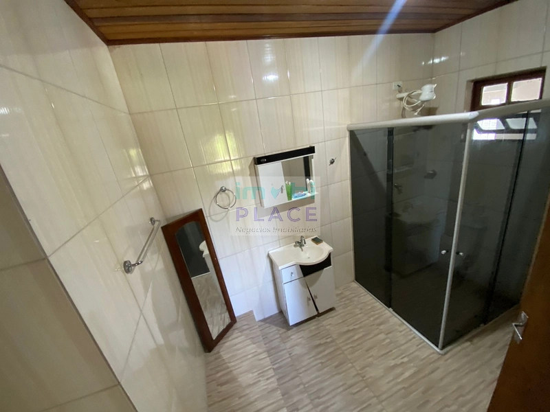 casa em tramandaí com 4 suites e piscina: 10ª foto da galeria de imagens do imóvel