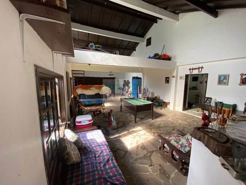 casa em tramandaí com 4 suites e piscina: 4ª foto da galeria de imagens do imóvel