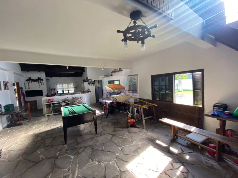 casa em tramandaí com 4 suites e piscina: 1ª foto da galeria de imagens do imóvel