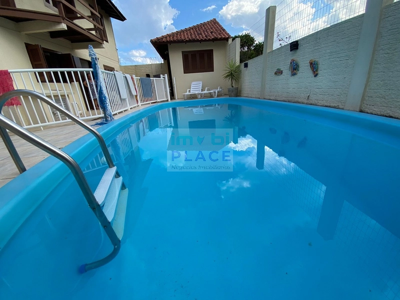 Charmoso sobrado de férias c/ piscina centro de Imbé até 10 pessoas: 15ª foto da galeria de imagens do imóvel
