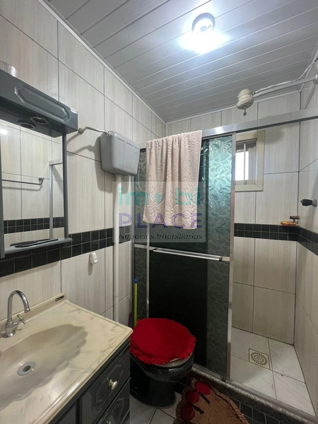 Casa Ampla com 3 Dormitórios e Terreno Espaçoso – Próxima ao Mar!: 7ª foto da galeria de imagens do imóvel
