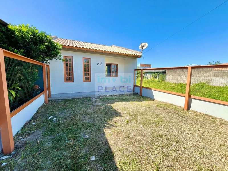 Casa Aconchegante com 2 Dormitórios na Zona Nova Sul: 2ª foto da galeria de imagens do imóvel