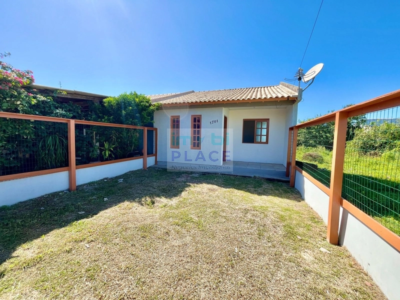 Casa Aconchegante com 2 Dormitórios na Zona Nova Sul: 1ª foto da galeria de imagens do imóvel