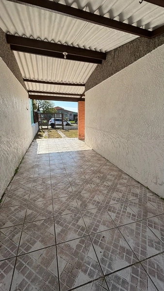Casa ampla com anexo e pátio murado no centro de Tramandaí: 2ª foto da galeria de imagens do imóvel