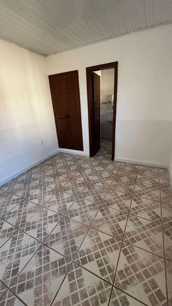 Casa ampla com anexo e pátio murado no centro de Tramandaí: 9ª foto da galeria de imagens do imóvel