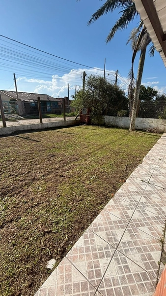 Casa ampla com anexo e pátio murado no centro de Tramandaí: 6ª foto da galeria de imagens do imóvel