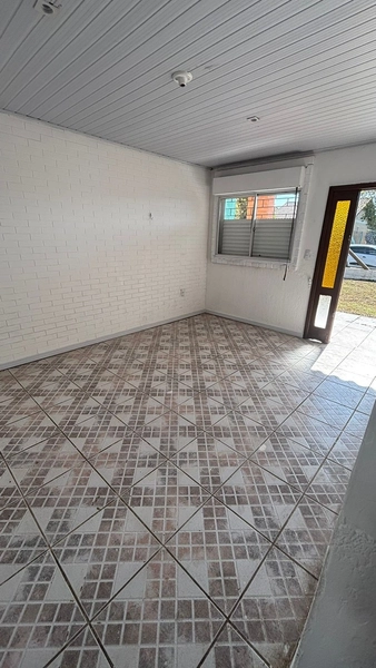 Casa ampla com anexo e pátio murado no centro de Tramandaí: 4ª foto da galeria de imagens do imóvel