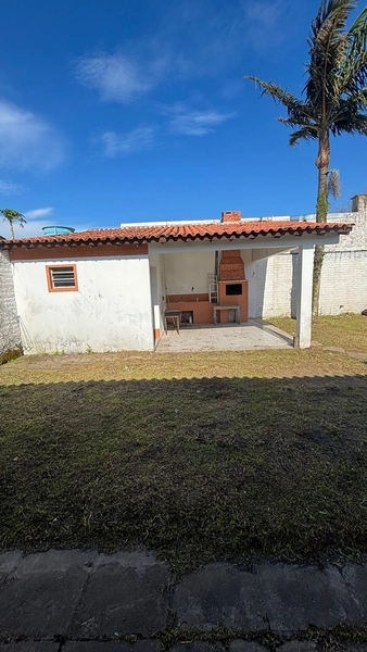 Casa ampla com anexo e pátio murado no centro de Tramandaí: 7ª foto da galeria de imagens do imóvel