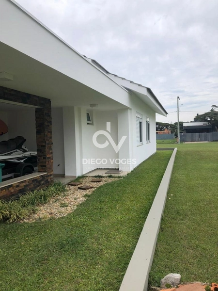 Casa a venda em condomínio fechado em Tramandaí, com 173m²: 2ª foto da galeria de imagens do imóvel