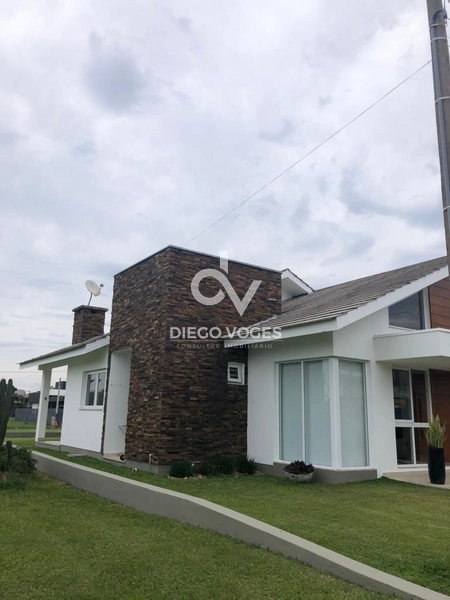 Casa a venda em condomínio fechado em Tramandaí, com 173m²: 1ª foto da galeria de imagens do imóvel