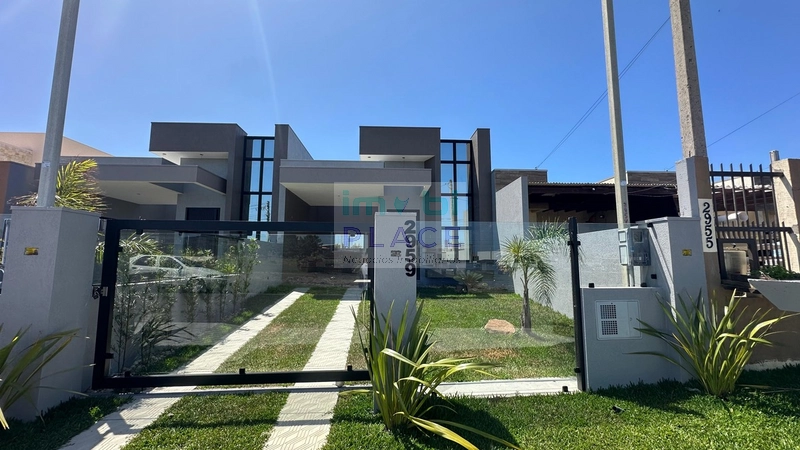 Casa com 3 dormitórios e paisagismo: 2ª foto da galeria de imagens do imóvel