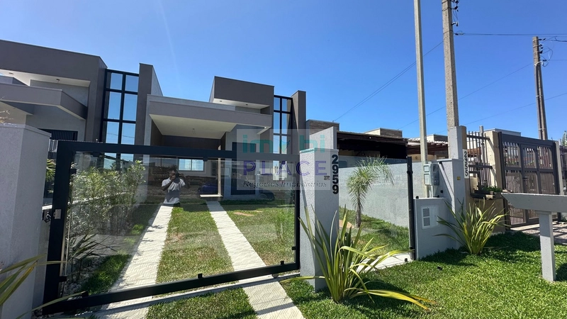 Casa com 3 dormitórios e paisagismo: 4ª foto da galeria de imagens do imóvel