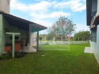Casa em Itapeva - Torres: 18ª foto da galeria de imagens do imóvel