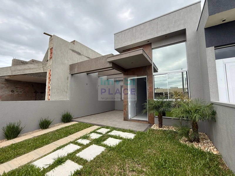 Casa nova em Imbé, excelente padrão construtivo.: 2ª foto da galeria de imagens do imóvel