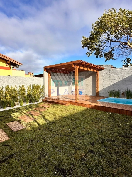 Casa ampla no Centro de Imbé – 4 dormitórios, piscina e espaço gourmet: 9ª foto da galeria de imagens do imóvel