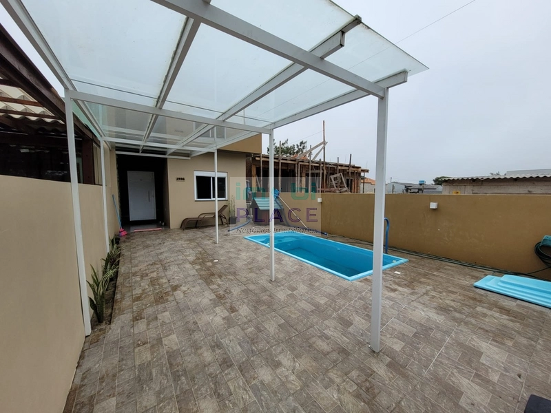 CASA COM PISCINA 2 DORMITÓRIOS EM NOVA TRAMANDAÍ: 8ª foto da galeria de imagens do imóvel