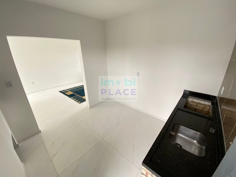 Linda residência nova e espaçosa com 3 quartos no centro de Imbé: 8ª foto da galeria de imagens do imóvel