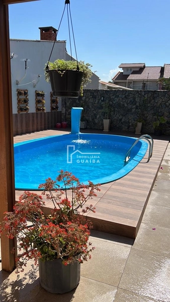 Excelente casa com piscina, 3 quartos. Bem localizada!: 2ª foto da galeria de imagens do imóvel