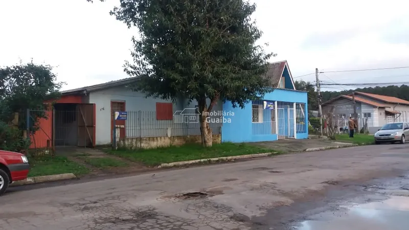 Terreno de esquina com casas: 4ª foto da galeria de imagens do imóvel