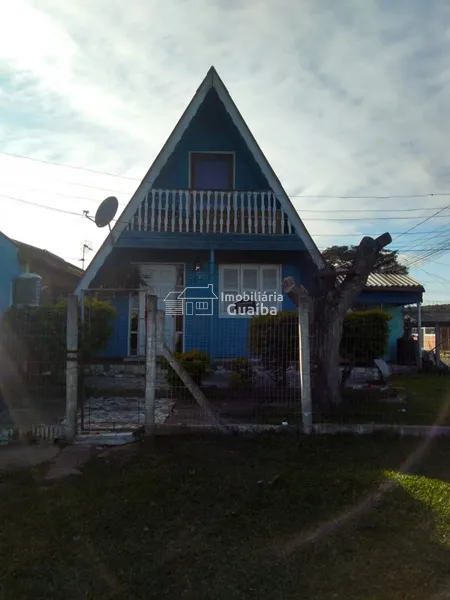 Terreno de esquina com casas: 3ª foto da galeria de imagens do imóvel