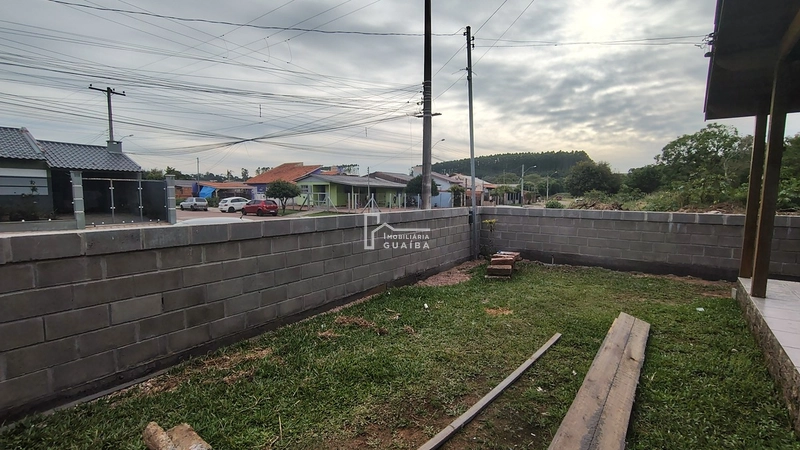 Bela casa de madeira á venda no bairro Jardim dos Lagos -Guaíba -RS: 18ª foto da galeria de imagens do imóvel