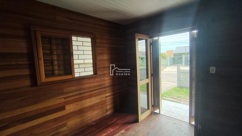 Bela casa de madeira á venda no bairro Jardim dos Lagos -Guaíba -RS: 24ª foto da galeria de imagens do imóvel
