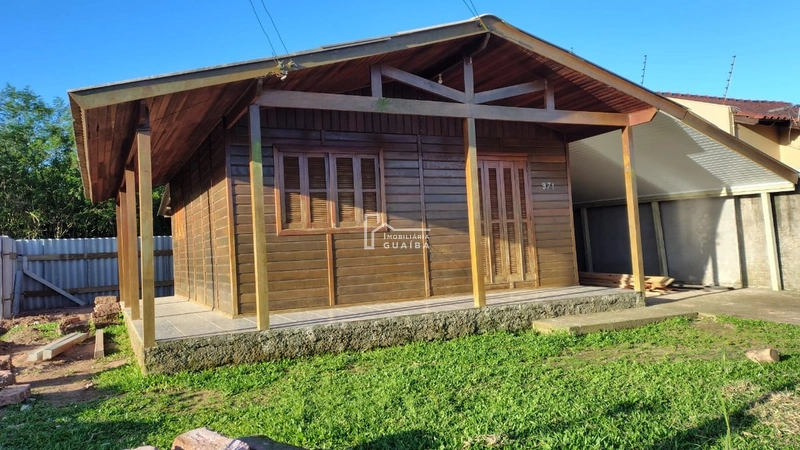 Bela casa de madeira á venda no bairro Jardim dos Lagos -Guaíba -RS: 14ª foto da galeria de imagens do imóvel