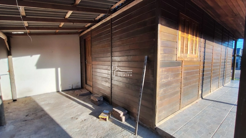 Bela casa de madeira á venda no bairro Jardim dos Lagos -Guaíba -RS: 16ª foto da galeria de imagens do imóvel