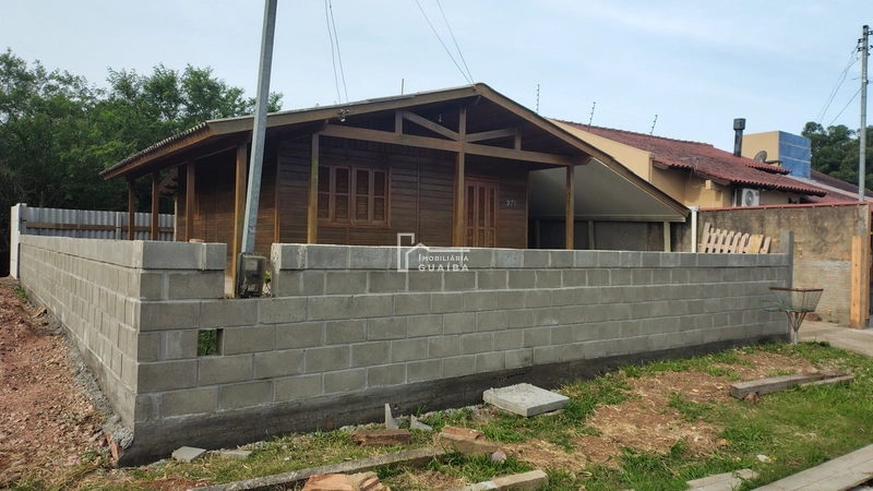 Bela casa de madeira á venda no bairro Jardim dos Lagos -Guaíba -RS: 15ª foto da galeria de imagens do imóvel