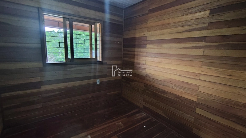 Bela casa de madeira á venda no bairro Jardim dos Lagos -Guaíba -RS: 5ª foto da galeria de imagens do imóvel