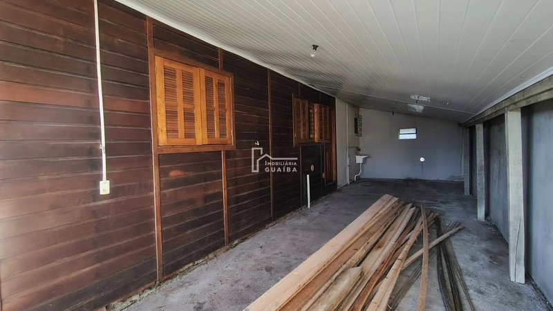 Bela casa de madeira á venda no bairro Jardim dos Lagos -Guaíba -RS: 4ª foto da galeria de imagens do imóvel