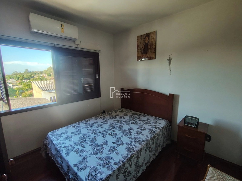 EXCELENTE CASA A VENDA NO BAIRRO CEL NASSUCA -GUAIBA -RS: 32ª foto da galeria de imagens do imóvel