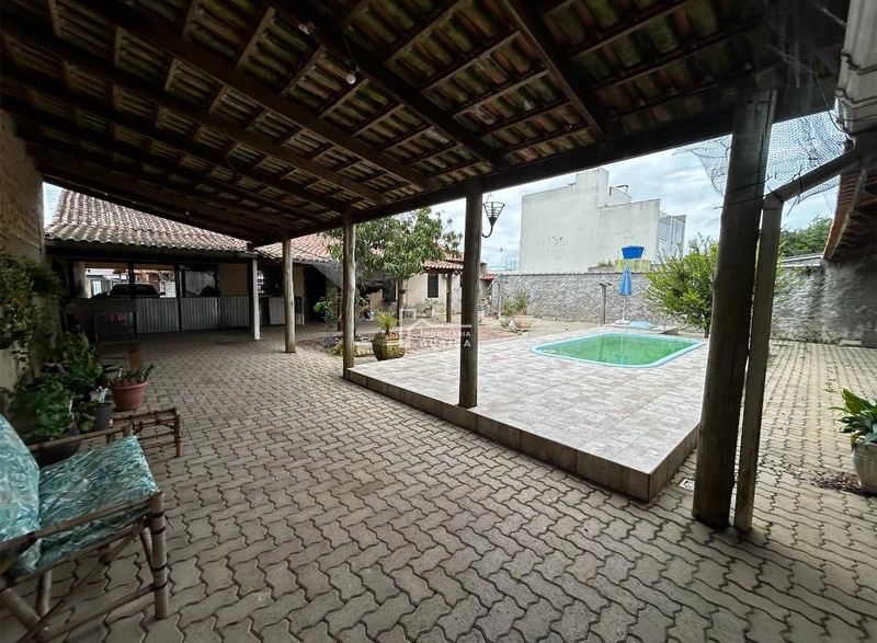 Casa com 4 Quartos sendo 2 Suítes –: 15ª foto da galeria de imagens do imóvel