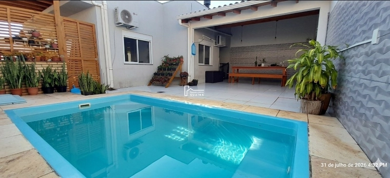 Casa completa com piscina, quiosque e energia solar no Jardim dos Lagos – Guaíba: 1ª foto da galeria de imagens do imóvel