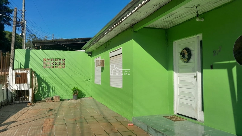 CASA A VENDA NO BAIRRO CEL NASSUCA -GUAIBA -RS .: 1ª foto da galeria de imagens do imóvel