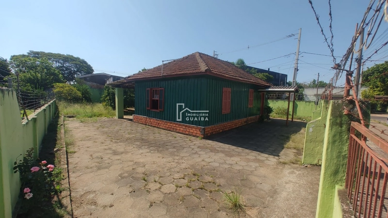 Imovel com terreno de esquina: 2ª foto da galeria de imagens do imóvel