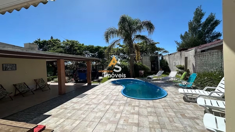 CASA COM PISCINA EM 2 TERRENOS NO ARAÇA: 1ª foto da galeria de imagens do imóvel